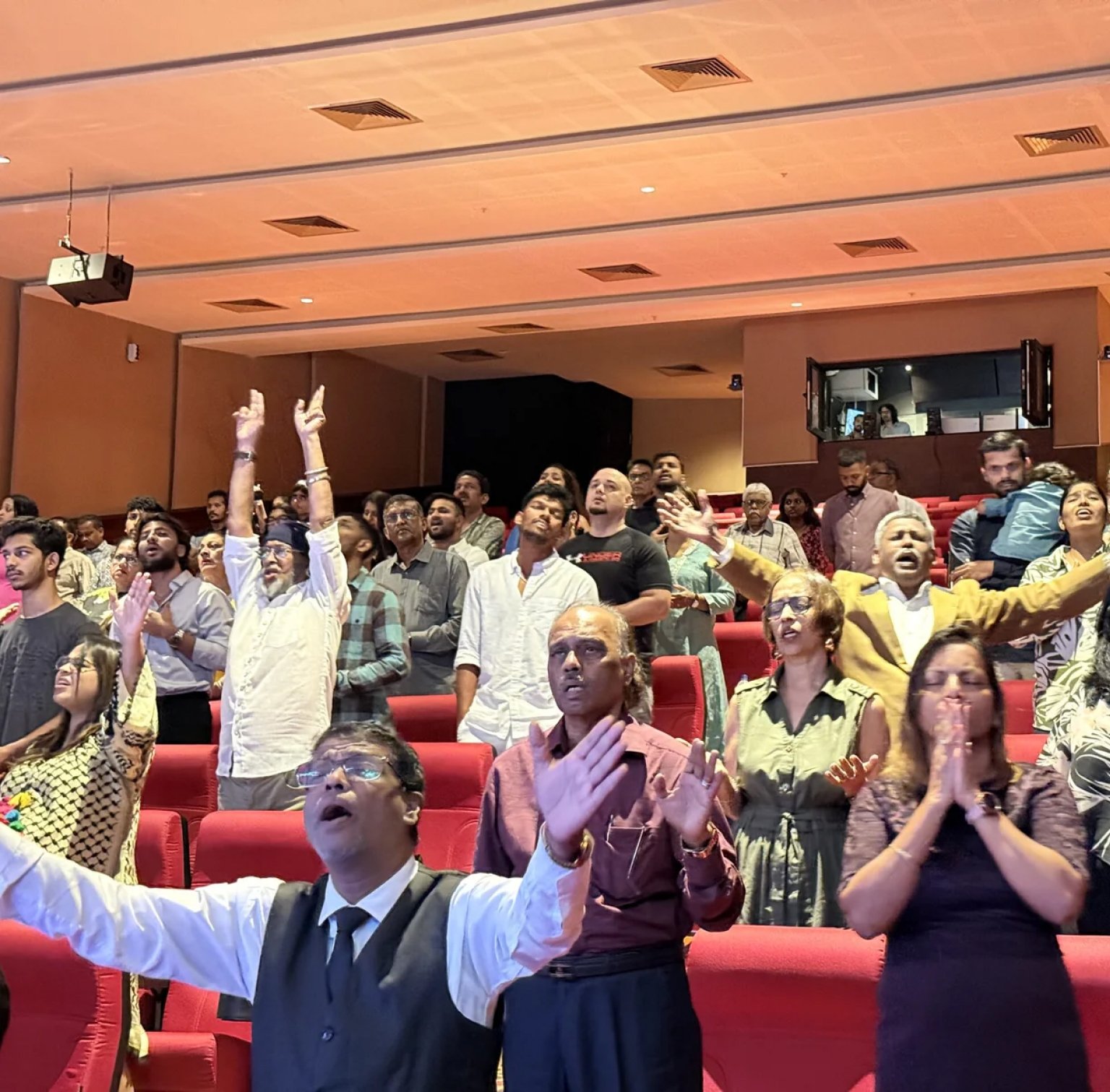 Church family worshipping together